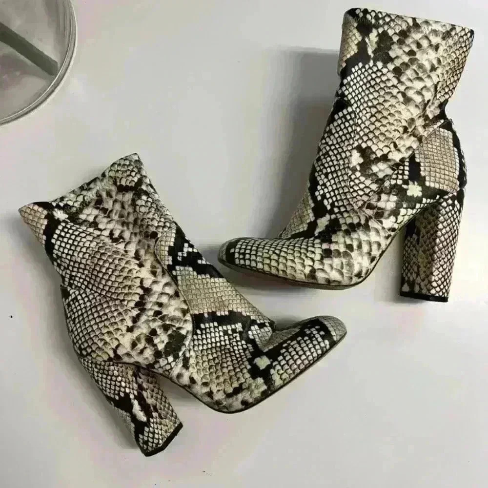 Call It Spring snakeskin booties
